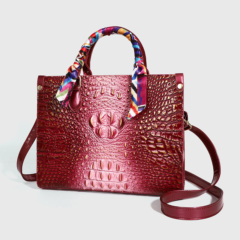 Fashionable golden crocodile patterned handbag with silk scarf